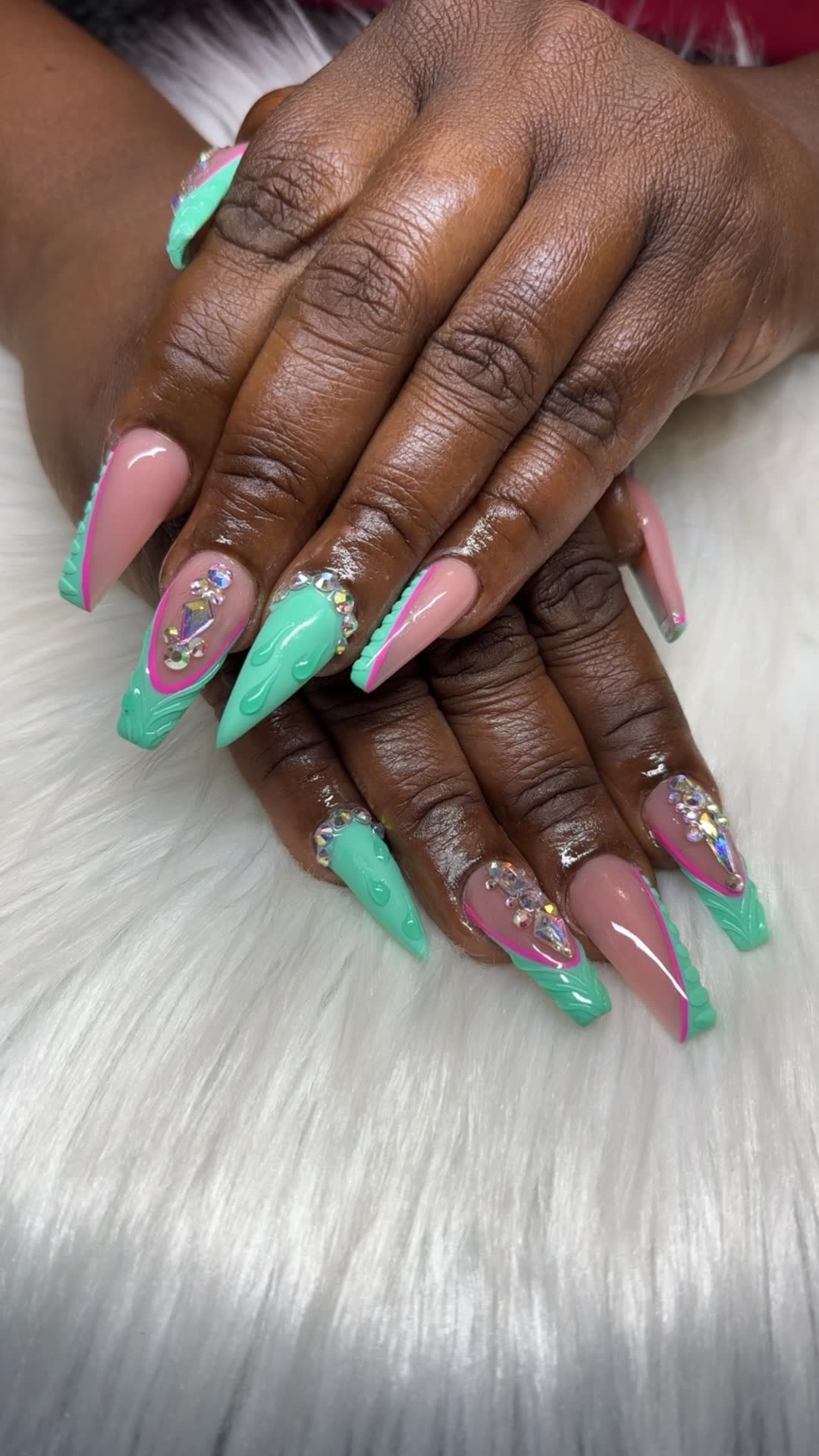 Mint green coffin with pink outline and jewels