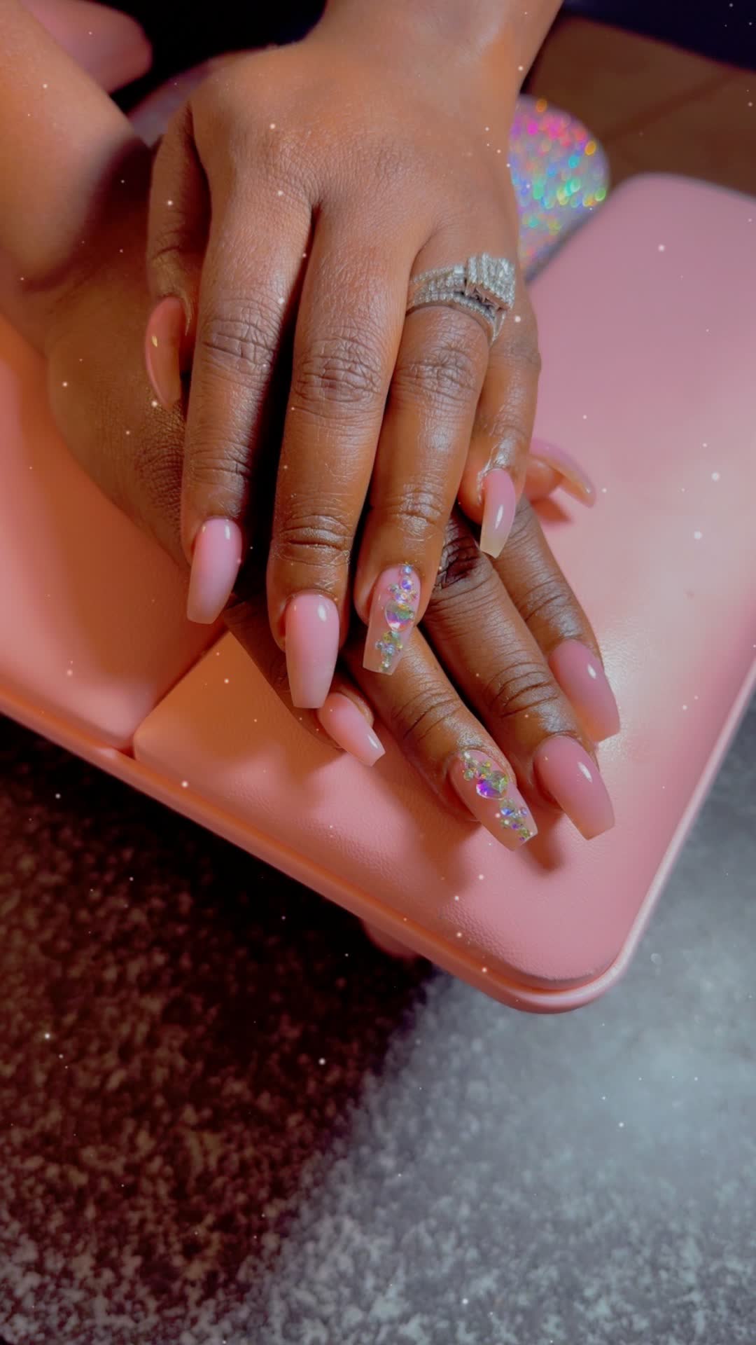 Baby pink coffin with gem accent nails
